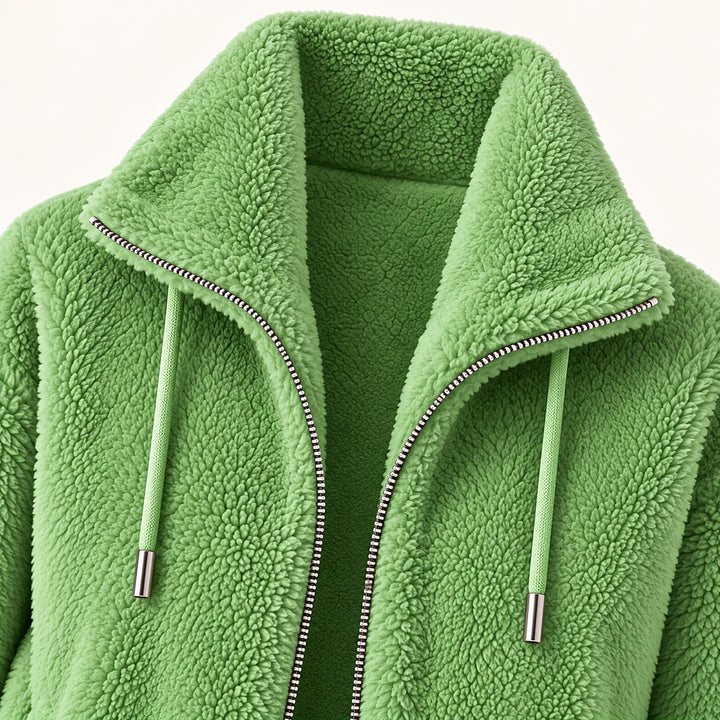 Céliane vert - détail du col montant, de la texture et de la fermeture